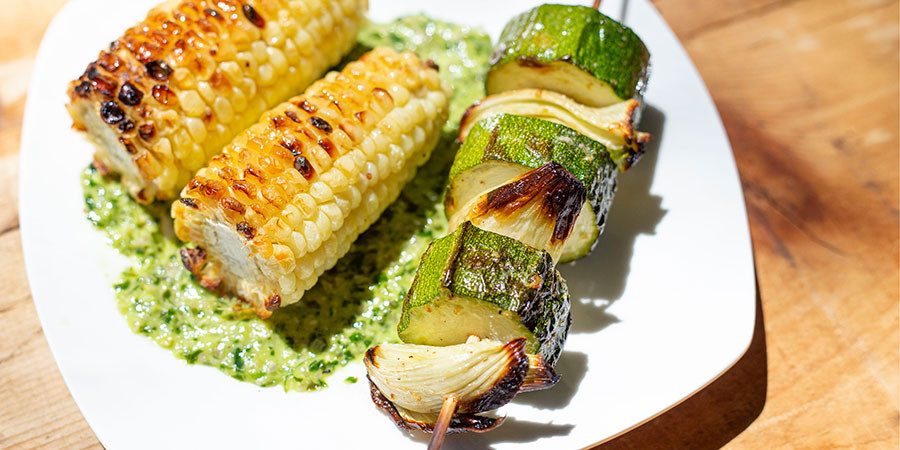 Grilled zucchini and fennel root skewers