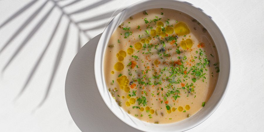 Creamy cauliflower rutabaga soup with sprouts